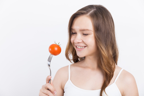 Girl with tomato - Photo, Image