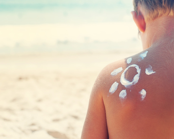 Suntan Boy Sign Sun Cream Sea Background - Photo, Image