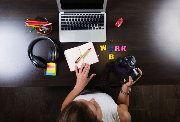 Woman working at creative workplace - Photo, Image