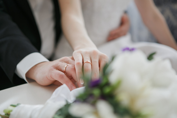 Wedding hands of a bride and groom - Foto, imagen