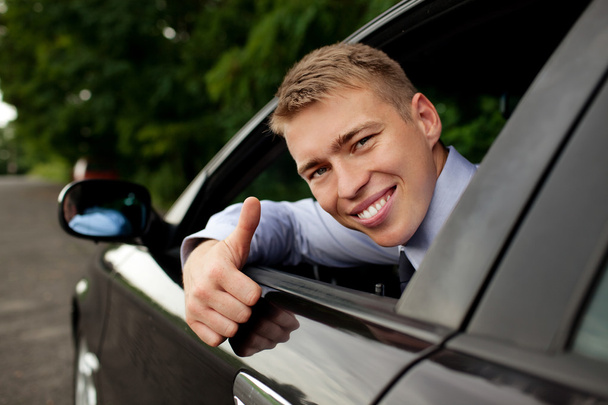 Driver thumbs up - 写真・画像