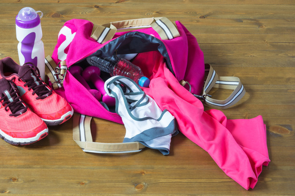 Women's sports bag with stuff inside - Фото, изображение