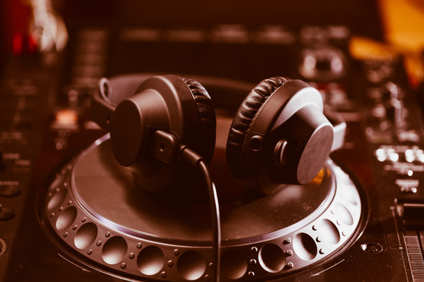 DJ headphones on CD music player - Photo, image