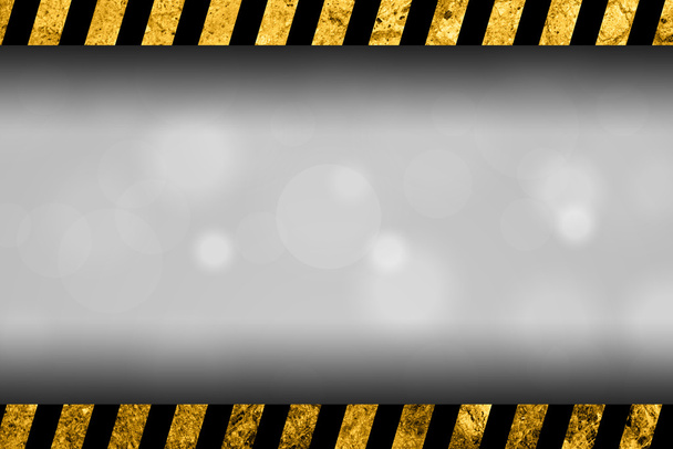 Fond gris abstrait avec rayures d'avertissement noires et jaunes
 - Photo, image