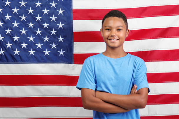 boy on American flag - Фото, изображение