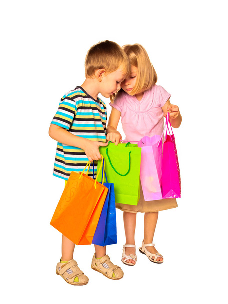 Happy kids with shopping bags. I - Zdjęcie, obraz