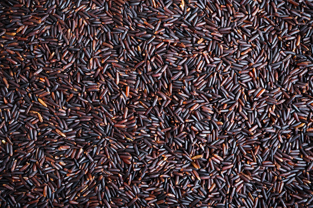 close up orgânico arroz preto fundo, textura
 - Foto, Imagem
