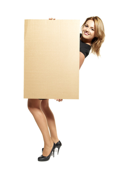 Attractive Woman Holding Up a Blank Sign - Isolated - Foto, afbeelding