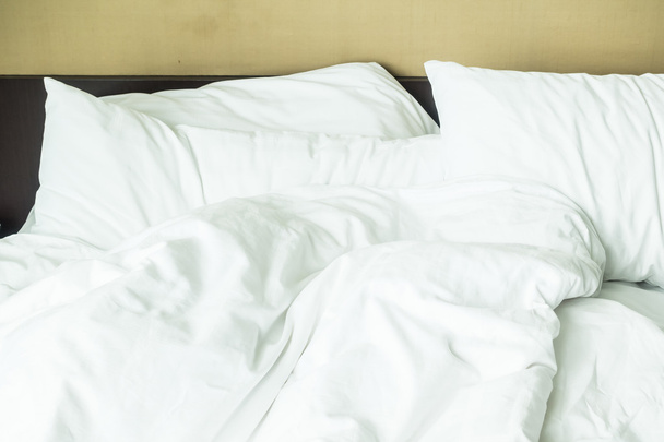 White pillows on bed - 写真・画像