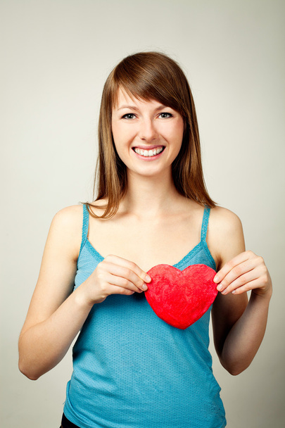 Pretty women in Love holding a heart shape - Photo, Image
