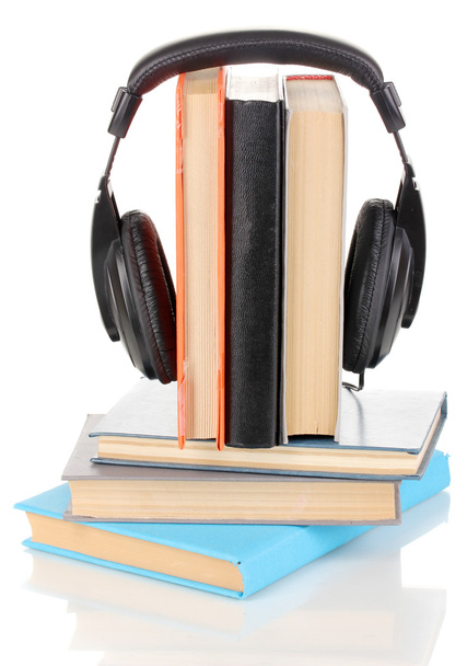 Headphones on books isolated on white - Фото, изображение