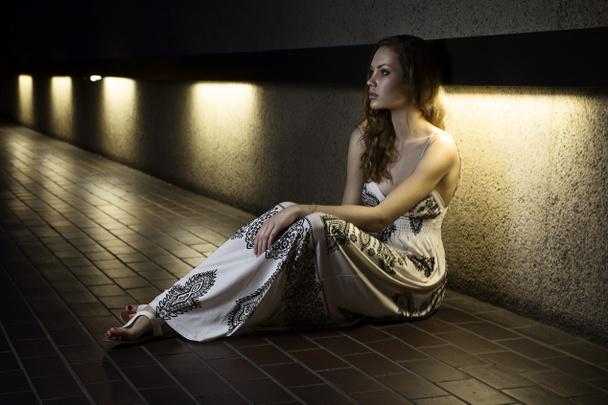 Portrait of a beautiful fashion model girl with white dress in post modern urban settings - Photo, Image