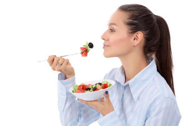 Une belle fille mangeant des aliments sains
 - Photo, image