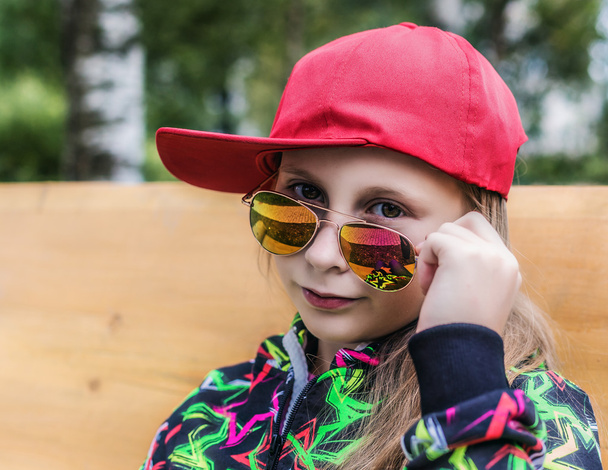 Girl teenager in sunglasses. - Фото, изображение