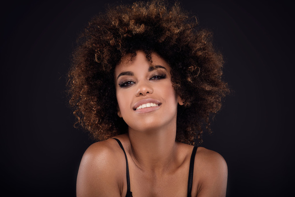 Beauty closeup portrait of girl with afro. - 写真・画像