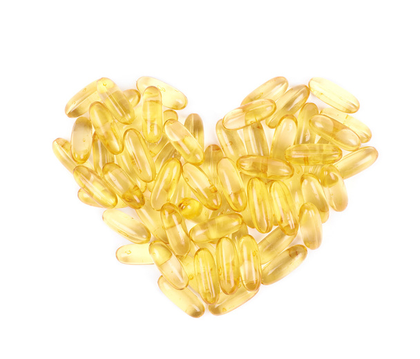 Heart shape made of softgel pills - Photo, Image