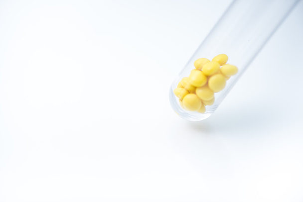 pills or drugs in glass tube - Foto, imagen