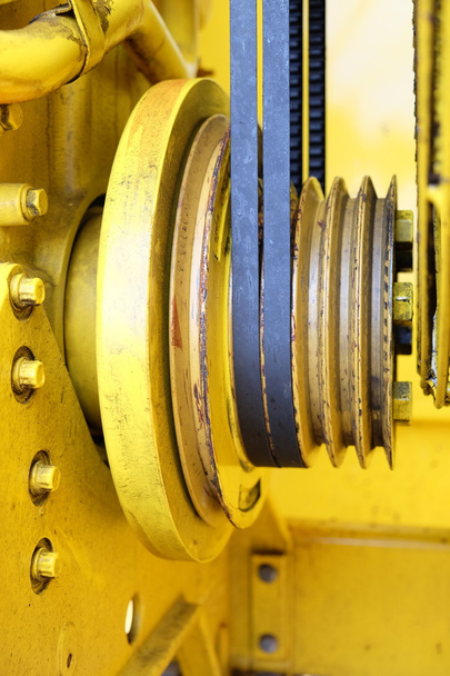 Yellow engine transmission from wedge belts and pulleys - Photo, Image