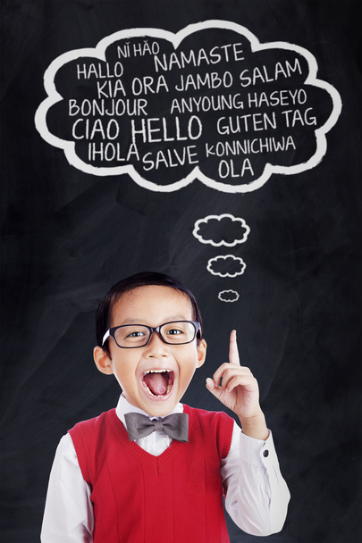 Little boy speaks in different languages - Фото, изображение