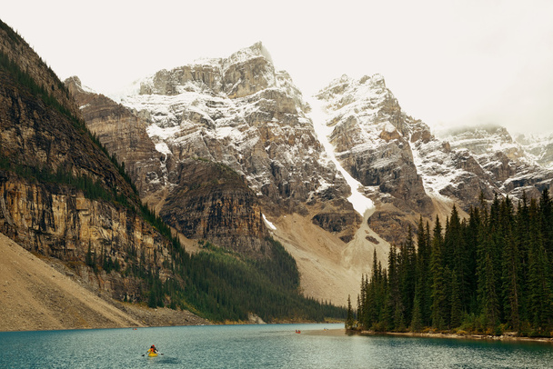 Moraine Lake with snow capped mountain  - Photo, Image