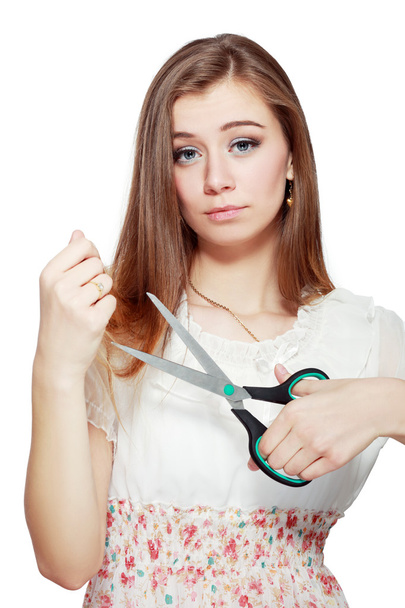 woman cutting her hair - Fotoğraf, Görsel