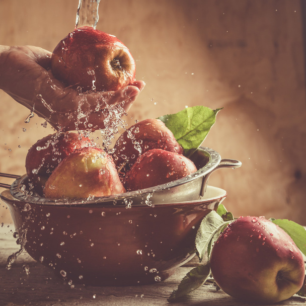 Washing apples with water splashes - Photo, image