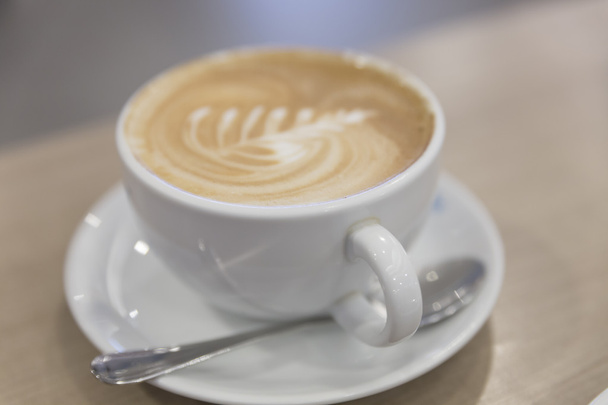 café capuchino caliente con arte latte
 - Foto, imagen