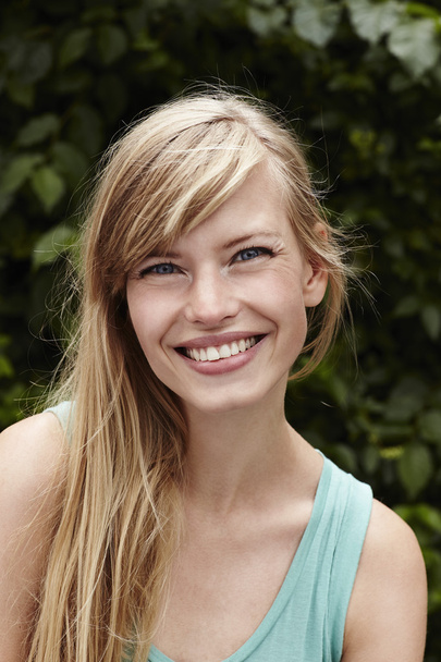 Smiling blue eyed blond woman - Fotoğraf, Görsel