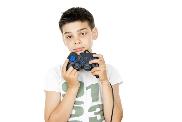 chłopiec trzyma joystick na białym tle - Zdjęcie, obraz