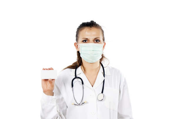 Doctor girl holds a business card - Foto, imagen