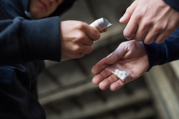 close up of addict buying dose from drug dealer - Fotografie, Obrázek