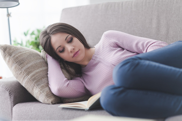 Girl resting and reading a book - Φωτογραφία, εικόνα