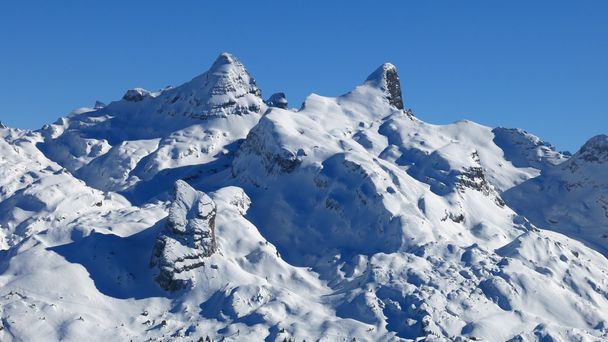 Snow covered mountains in the Swiss Alps - Photo, Image