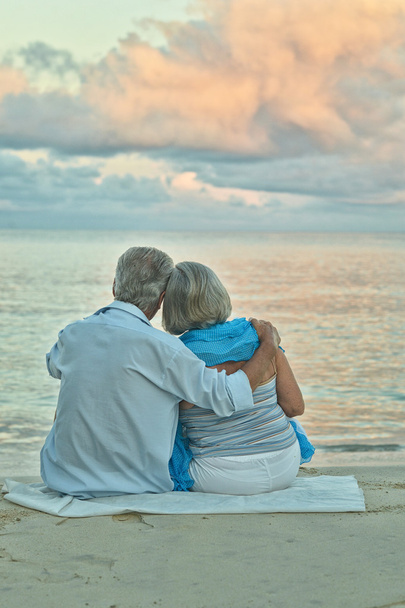 elderly couple rest at tropical beach - Fotó, kép