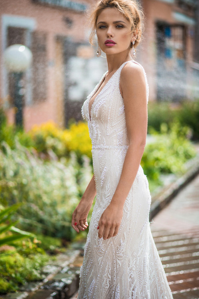 Beautiful girl in the wedding dress  - Фото, изображение