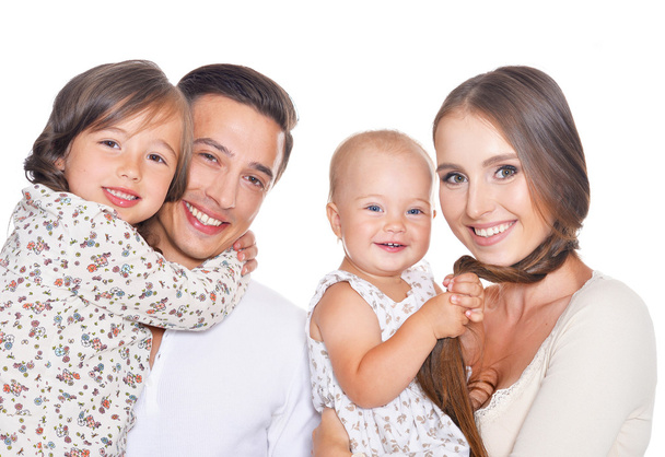 Щаслива сім'я з чотирьох на білому
 - Фото, зображення