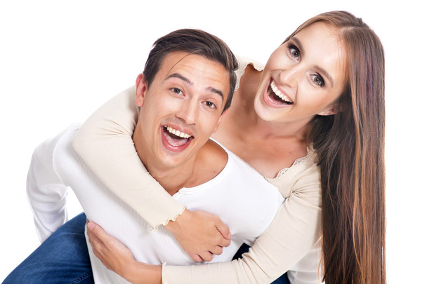Happy young couple embracing - Foto, Bild