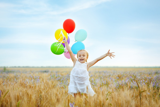 Little girl with balloons - Photo, Image