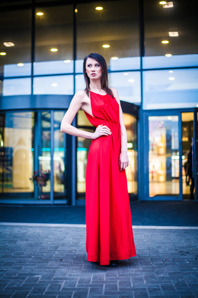 Fashionable and stylish girl in a red dress - Photo, Image