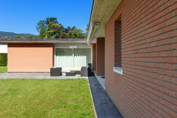 brick house with garden - Valokuva, kuva
