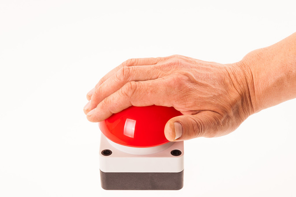 Hand pushing a red buzzer - Fotoğraf, Görsel