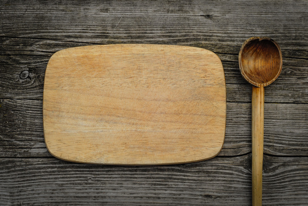 Prkénko s lžící na rustikální dřevěné pozadí - Fotografie, Obrázek