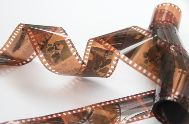 Κάμερα φωτογραφία ταινία λουρίδων απομονωθεί σε λευκό φόντο - Φωτογραφία, εικόνα