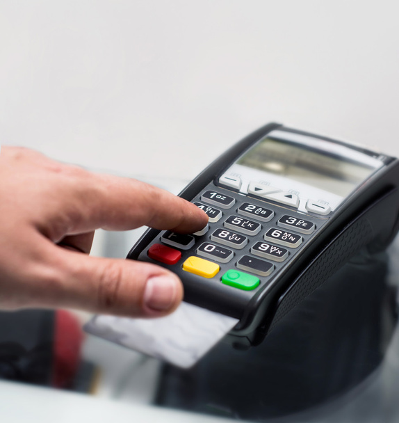 Credit or debit card password payment. Customer hand is entering - Fotografie, Obrázek