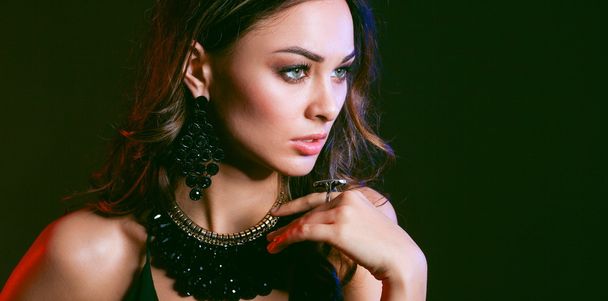 Portrait of a beautiful woman with necklace - Foto, Imagen
