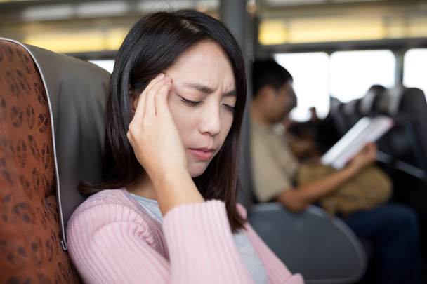woman suffering from headache on the ferry - Photo, image