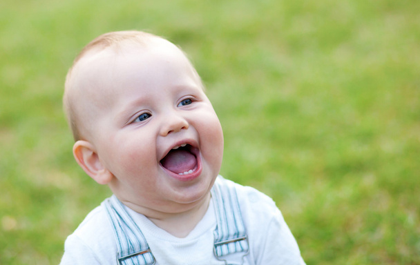 Happy adorable little boy outdoors - Foto, afbeelding
