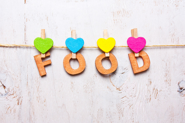 η λέξη «τρόφιμα» από τα ξύλινα γράμματα - Φωτογραφία, εικόνα