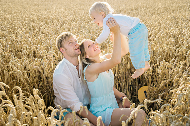 summer happy portrait of mother,father and son - Foto, Bild