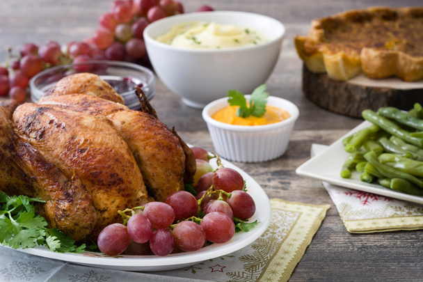 Turkey thanksgiving dinner on rustic wooden background - Photo, Image